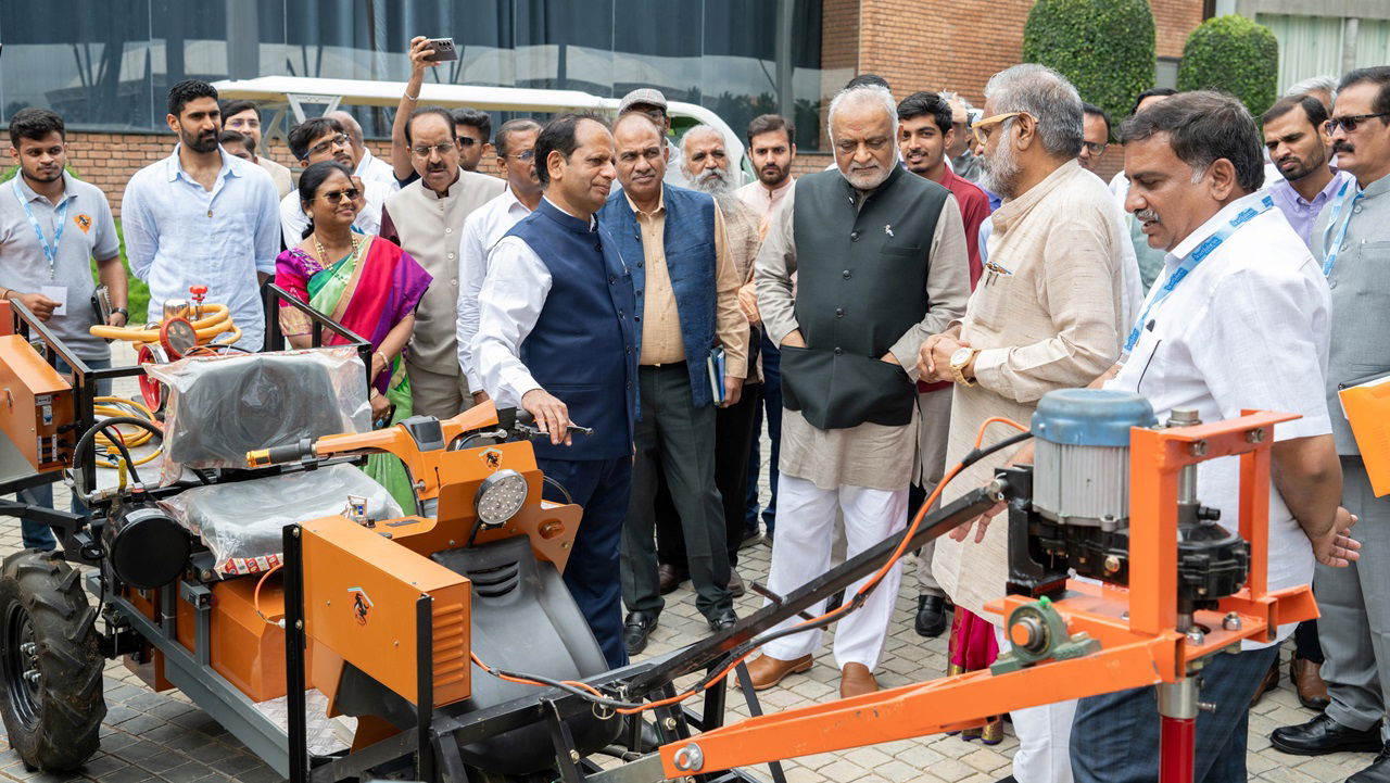 Rev. Daaji, Dr. R.C. Agrawal and Dr. Himanshu Pathak are being given a tour of the agricultural infrastructure and equipment at Kanha Shanti Vanam as part of the inaugural National Conference of Vice Chancellors of Agricultural Universities.