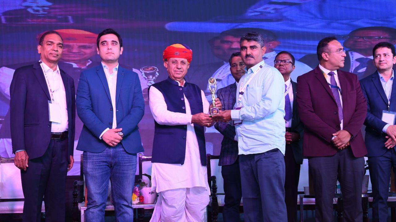 Bhagirath Choudhary presenting awards to progressive farmers