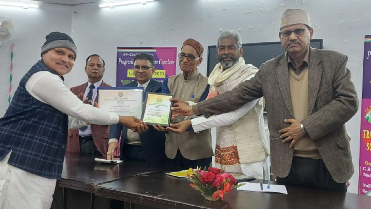 Satyavan receiving awards for his outstanding contributions to sustainable agriculture