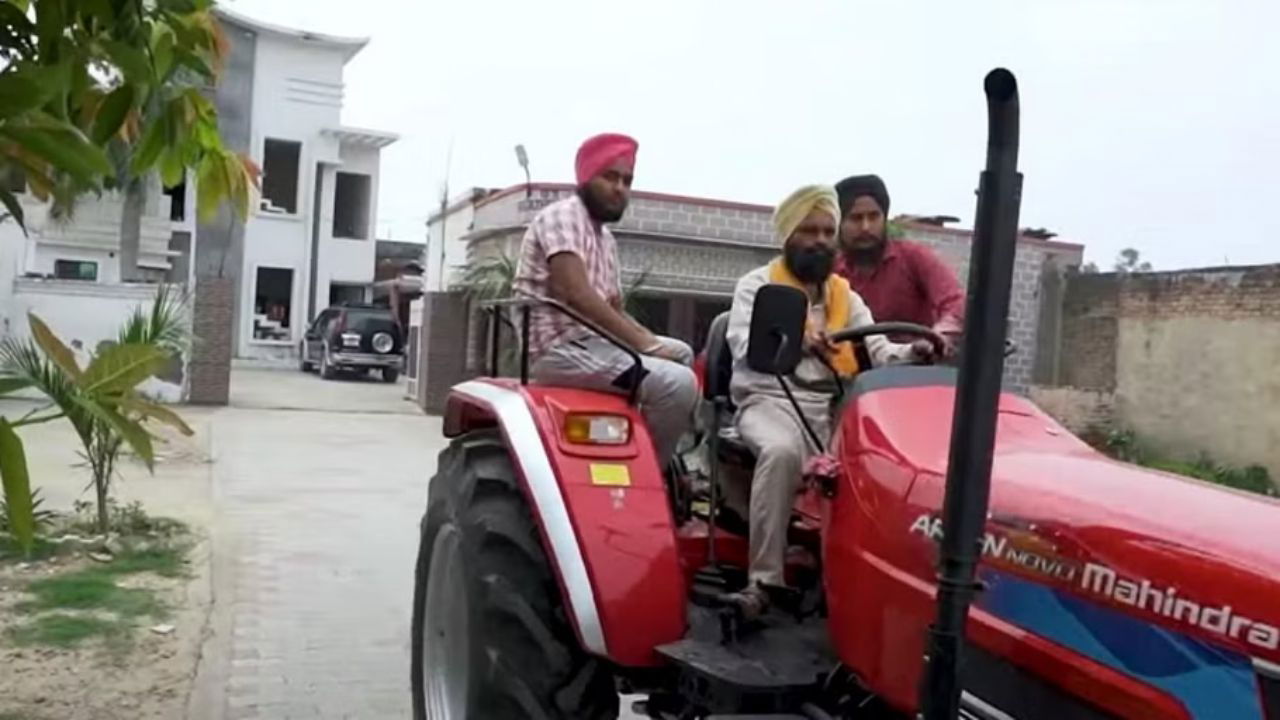 Progressive Farmer Gurmej Singh, along with two fellow farmers, driving the Mahindra Arjun Novo 605 DI 4WD Tractor