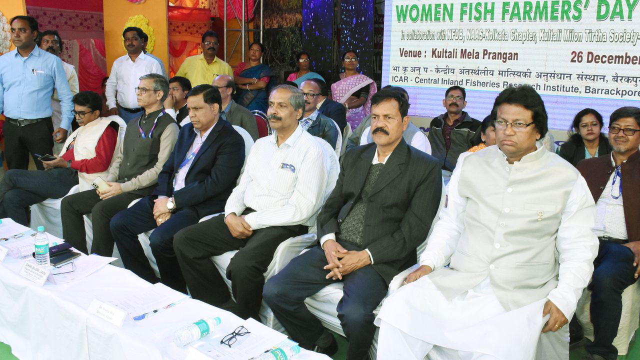 Esteemed guests at Kultali Mela Prangan during the 'Mahila Matsyajibi Diwas' (Women Fish Farmers' Day) celebration