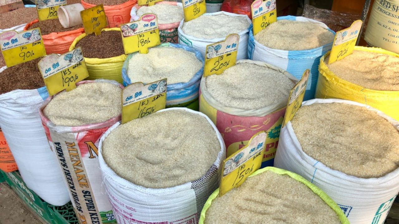 Under the new policy, State Governments and their designated agencies can procure up to 12 LMT of rice from FCI at a fixed price of Rs 2,250 per quintal. (Photo Source: Canva)