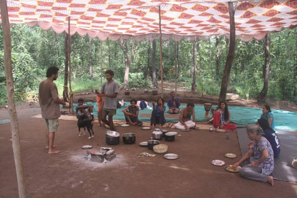 Community cooking and eating at  Vanvadi vanutsav