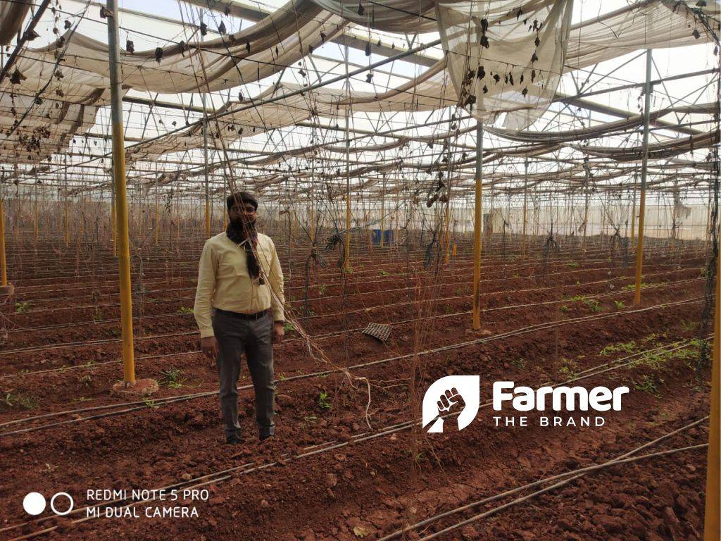 Gaurav at a freshly tilled farm