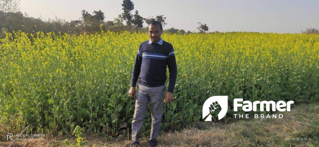 Subhash Chandra Mahto in a mustard farm