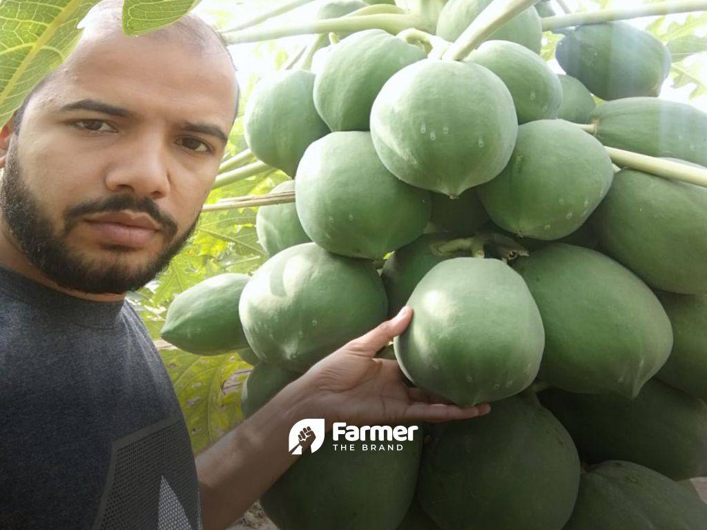 Ashok with papayas