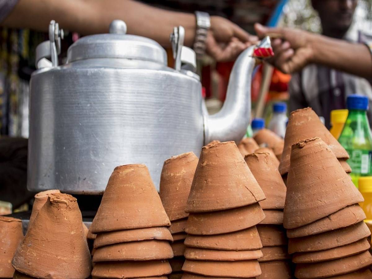 Indian tea pot and earthen tea cups