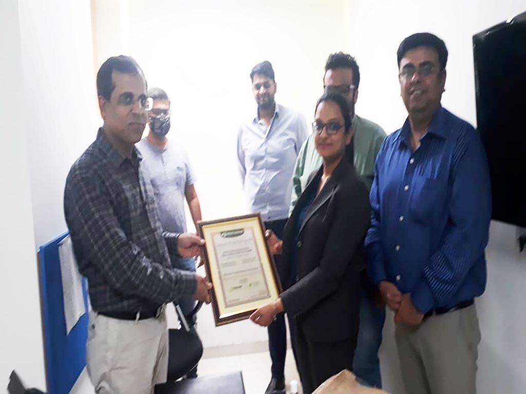 Mr. Ashish Agrawal receiving award from Mrs. Megha Sharma and Mr. Harsh Kapoor of Krishi Jagran