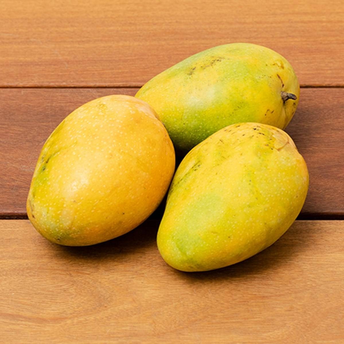 Safeda mangoes On The Wooden Floor