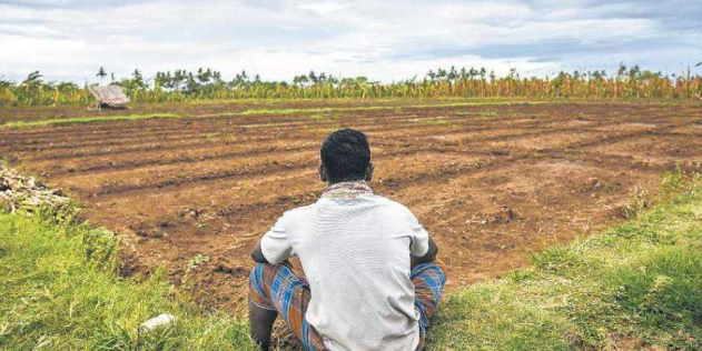 Farmer waiting for rain