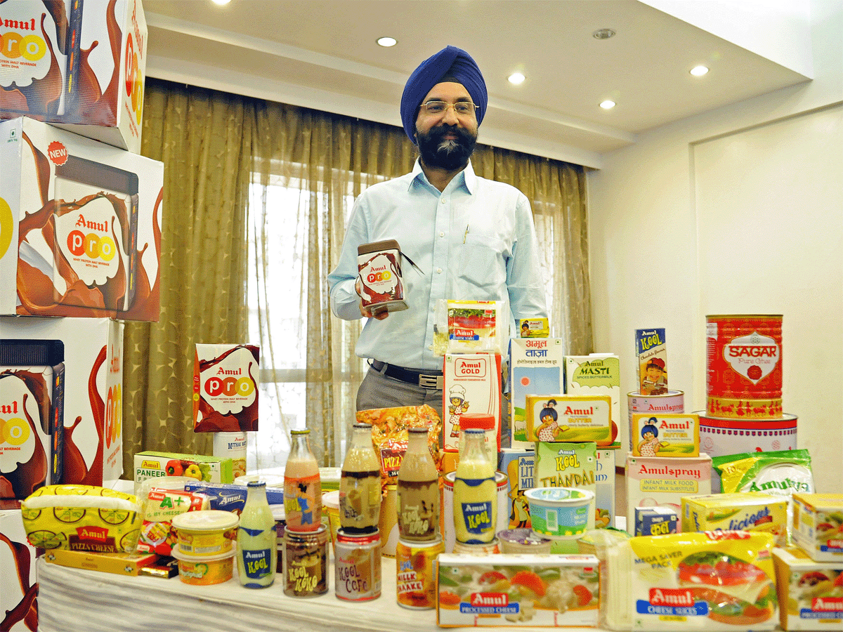 Amul Managing Director RS Sodhi with Amul's products
