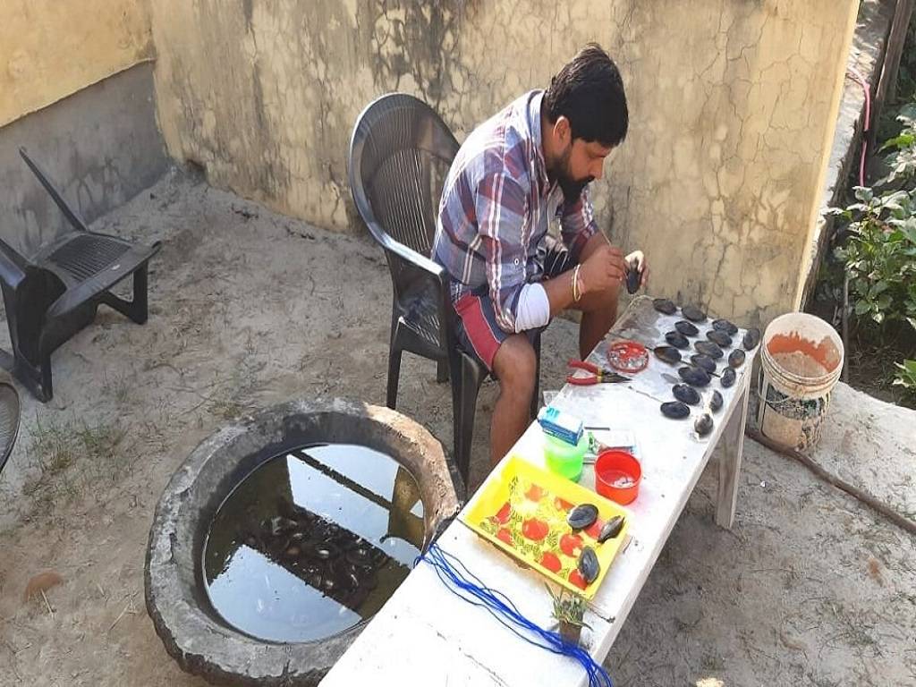 Nitil doing pearl farming at home