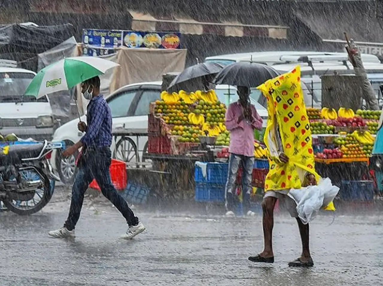 People walking on the streets in heavy rain