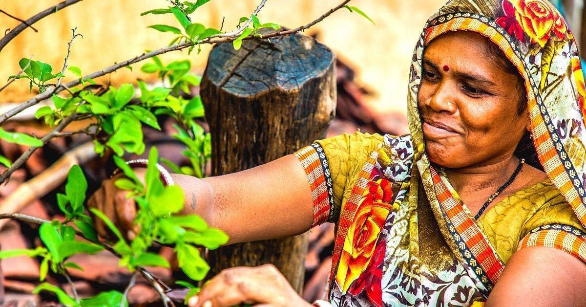 Female Farmer working and smiling