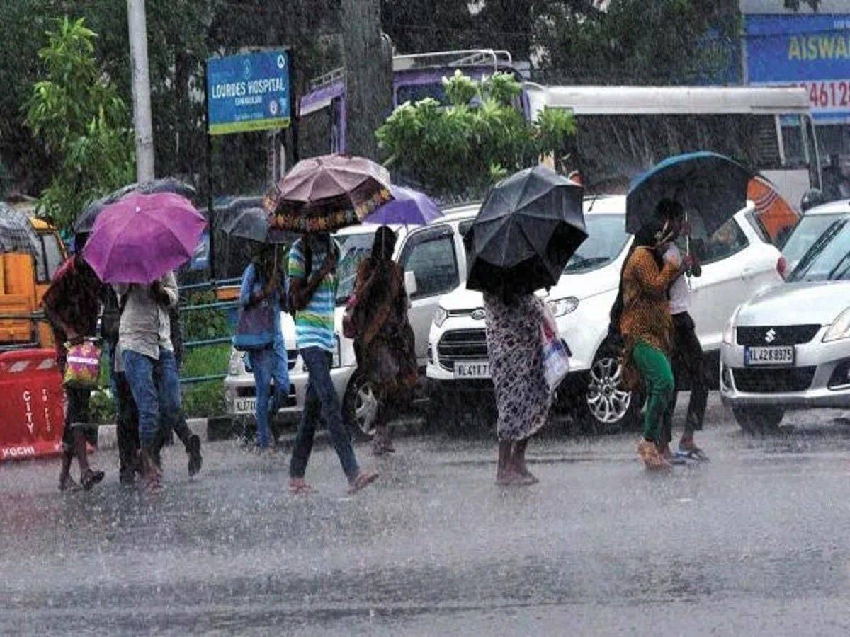 People crossing road in heavy rains