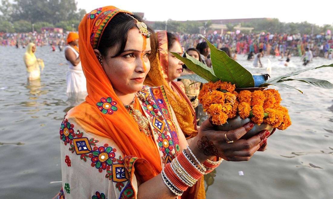 Women Performing Chhath Puja Rituals