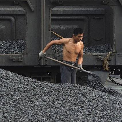 Worker At A Coal Mine In China