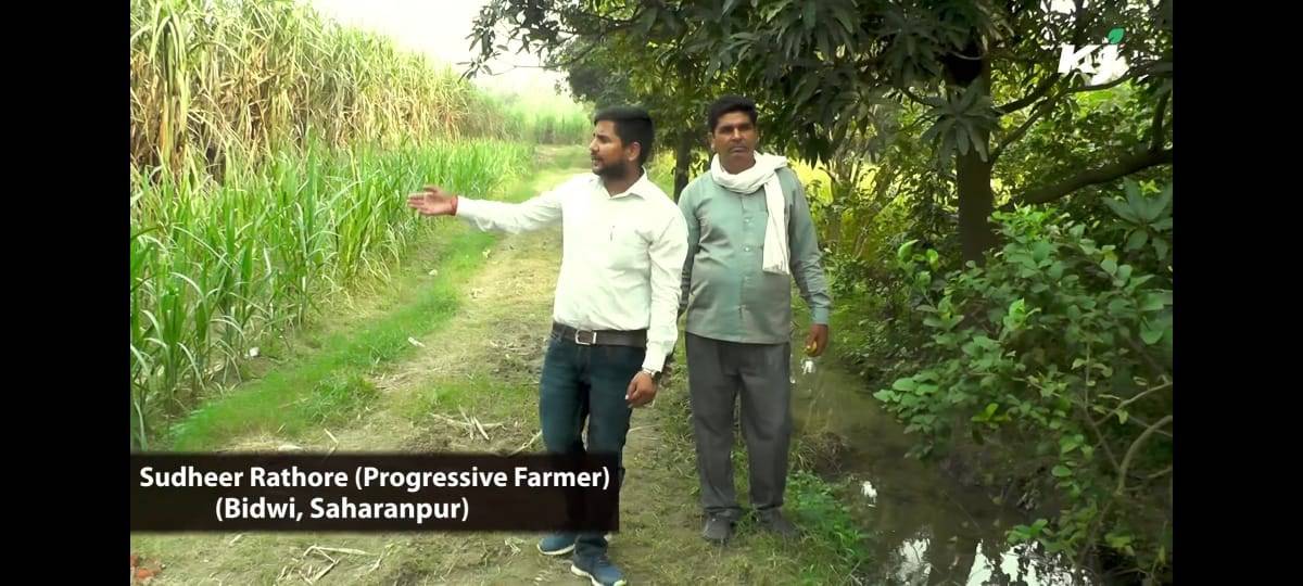 From Left - Right: Krishijagran Reporter Vivek Rai (L) With Farmer Sudheer Rathore (R)