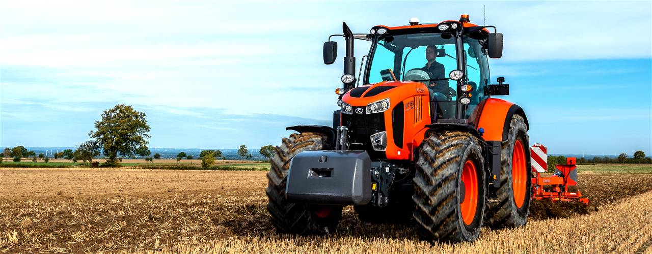 Tractors Tilling The Field