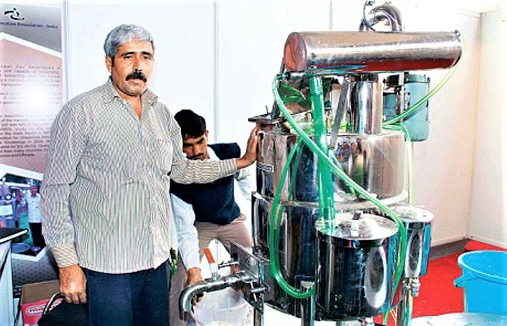 Dharambir Kamboj with his Multipurpose Food Processing Machine