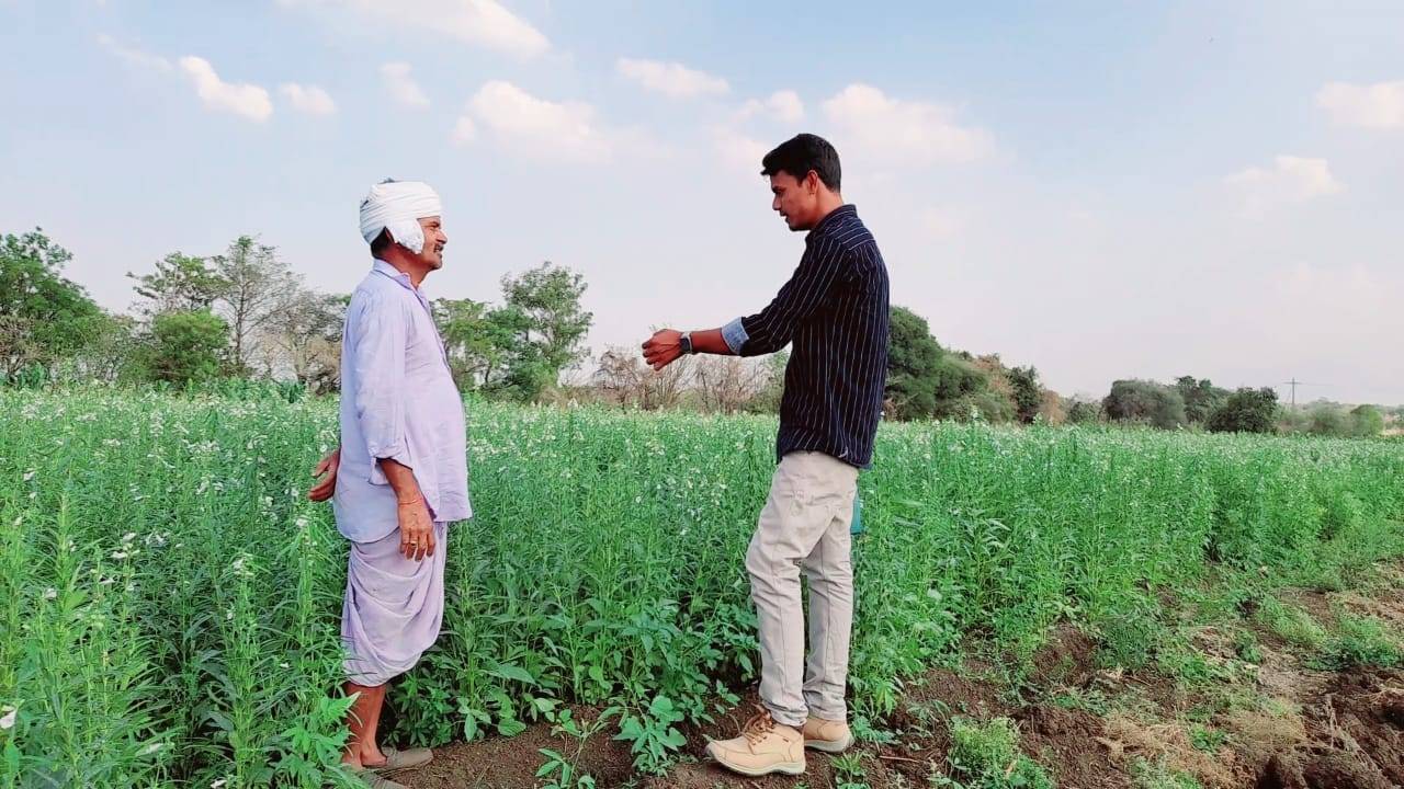 Gandla Santosh, Agriculture Extension Officer (AEO) interacting with farmer