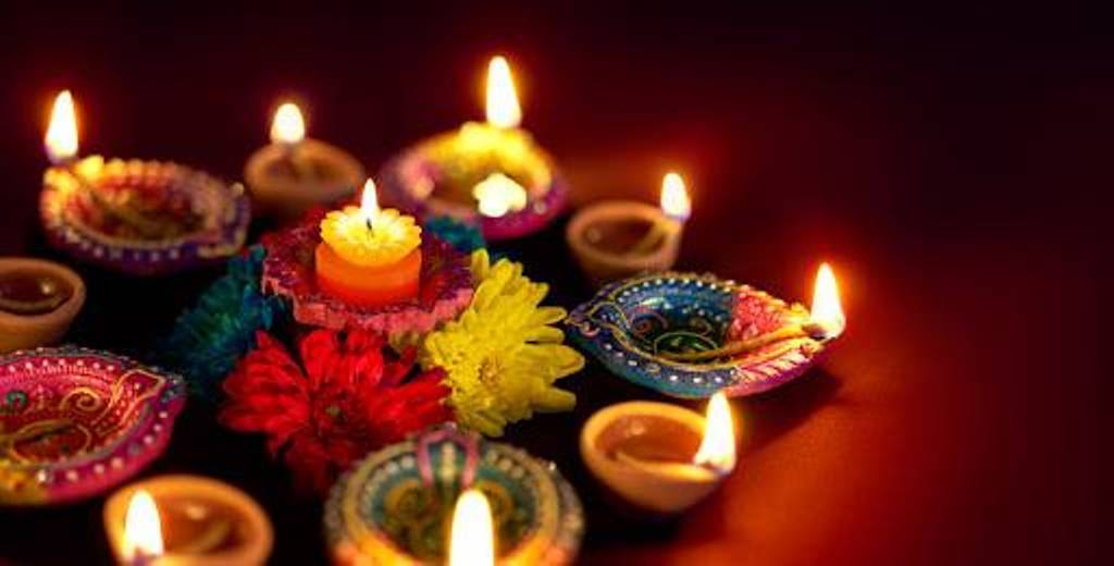 Diya and Candle with flowers