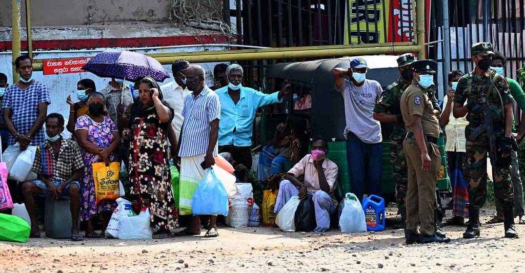 People Waiting In Queue To Buy Groceries