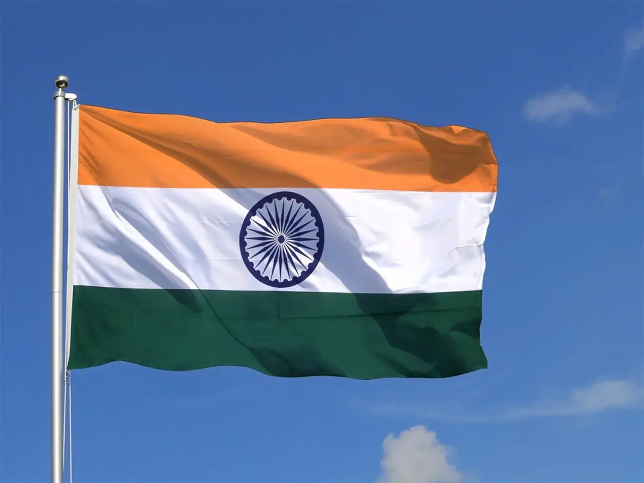 You can buy the Indian Flag online and get it delivered home by your nearest post office. There will be no GST charged.