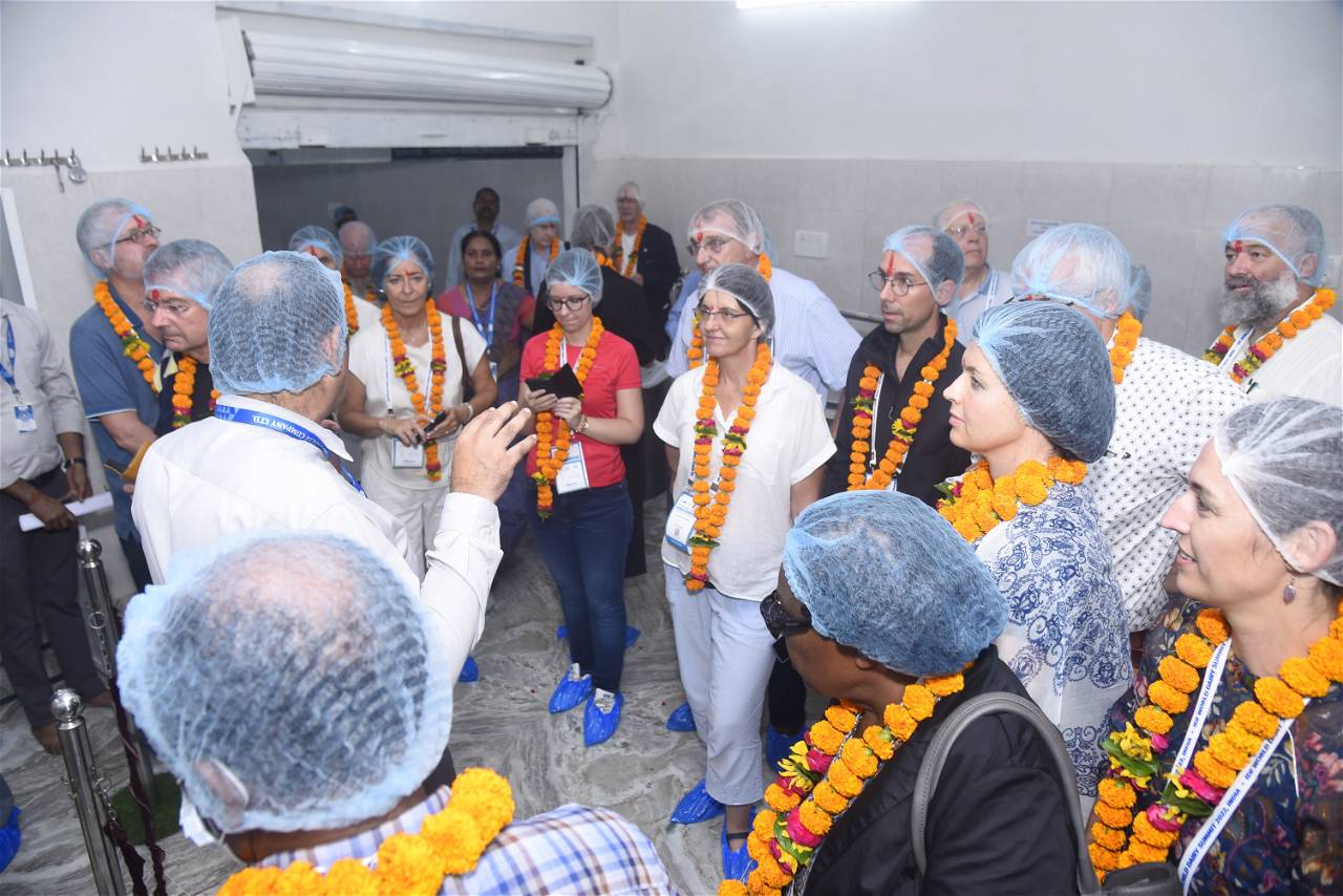 Foreign delegates of World Dairy Summit 2022 at the bulk chilling plant of Saahaj at Nanglapachori village.