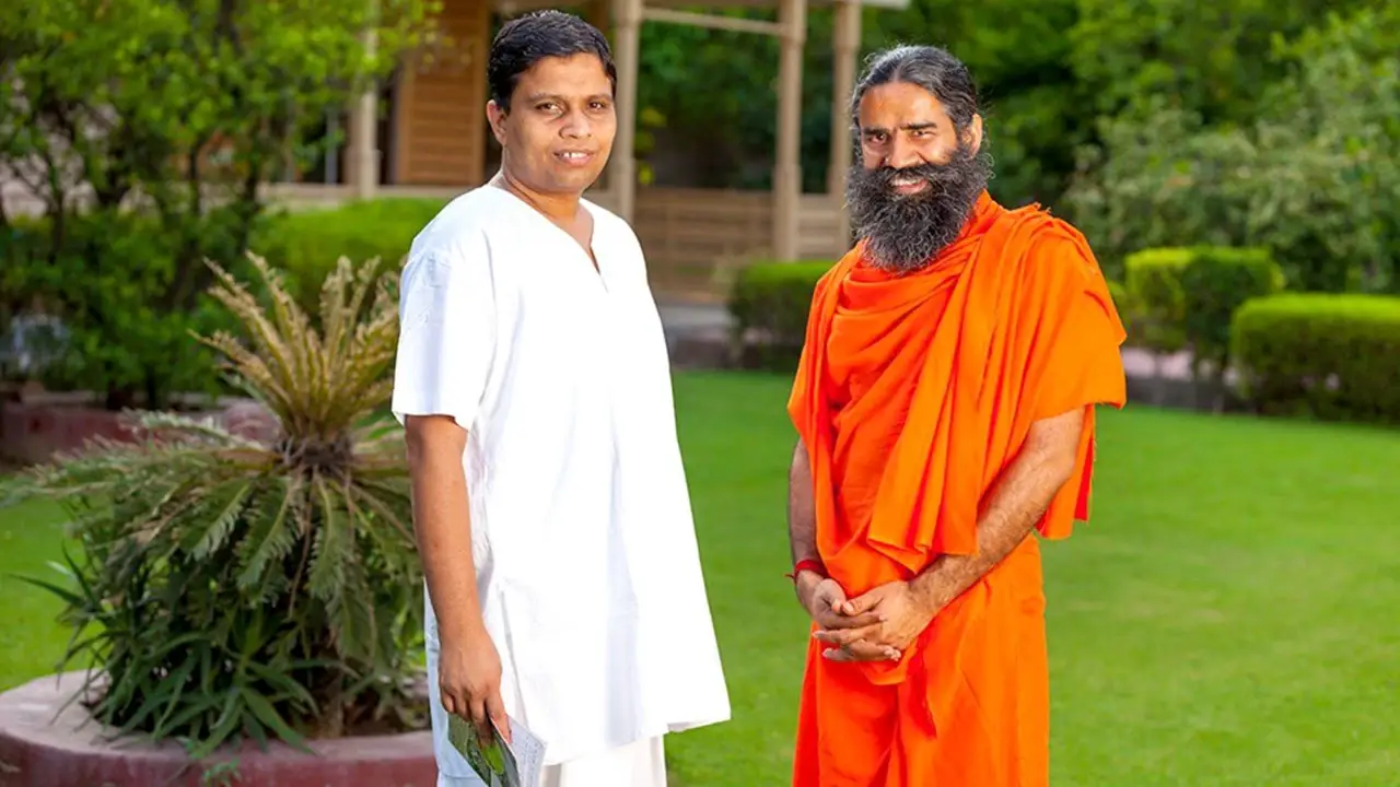 Acharya Balkrishna, owner of Patanjali Ayurved with Patanjali's brand ambassador Swami Ramdev
