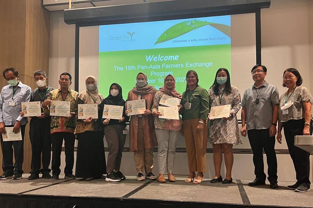 Participants on the stage, with their participation certificates, on the last day of the 16th Edition of Pan-Asia Farmers' Exchange Program.