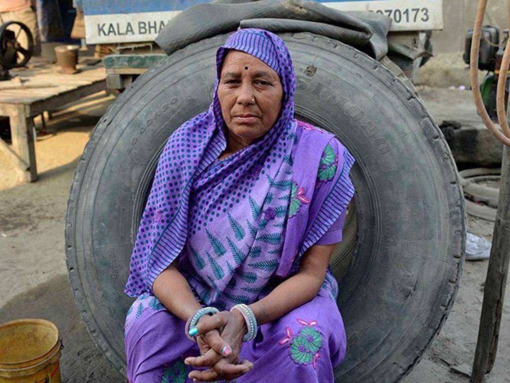 Truck mechanic Shanti Devi at her shop in Sanjay Gandhi Transport Nagar, New Delhi