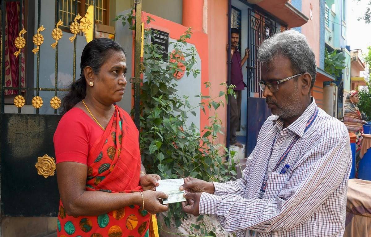 Tokens being distributed for pongal gift baskets