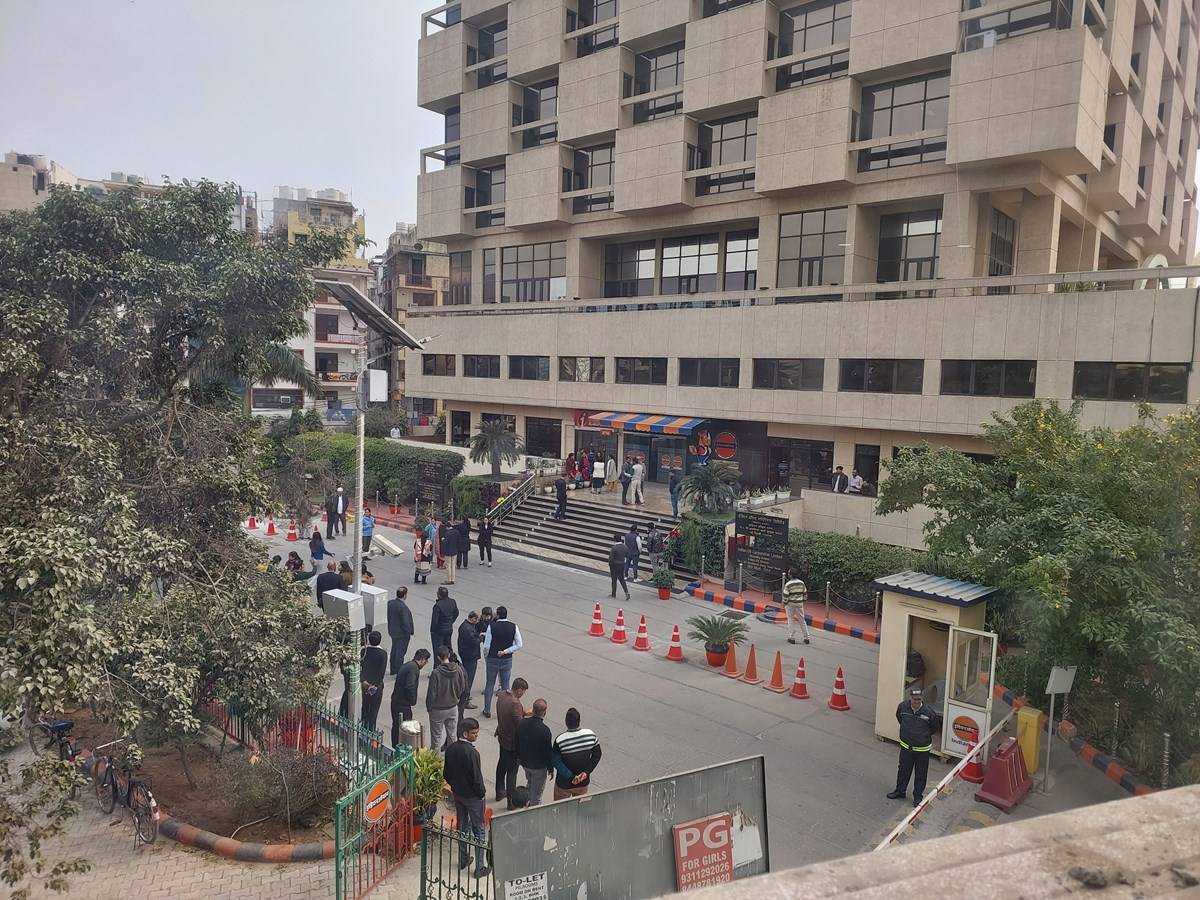 People outside Indian Oil Office in Green Park after the earthquake tremors were felt