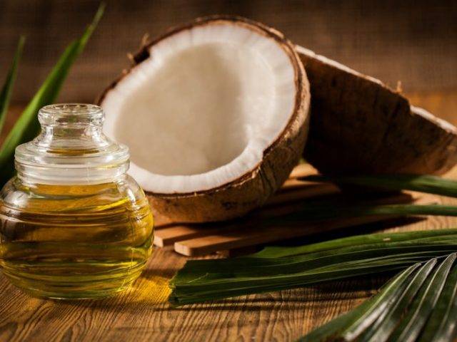 Coconut and its oil in the jar