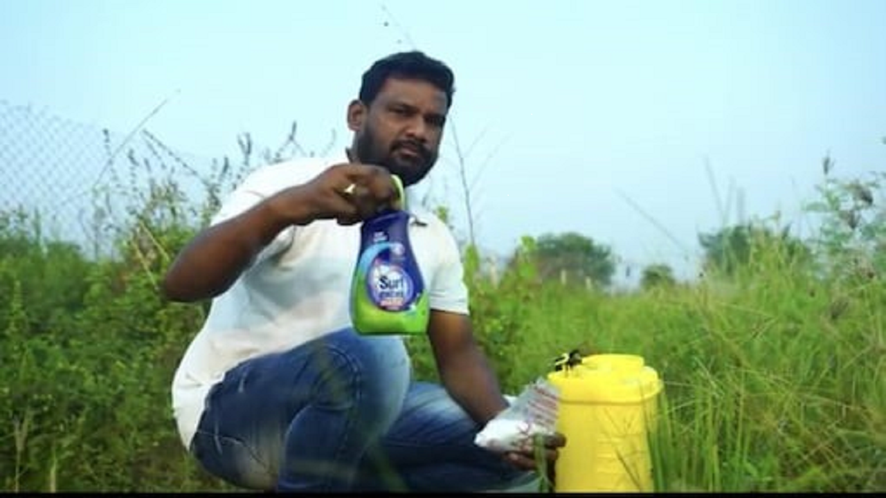 A farmer in Telangana using detergent-based farming for pest control