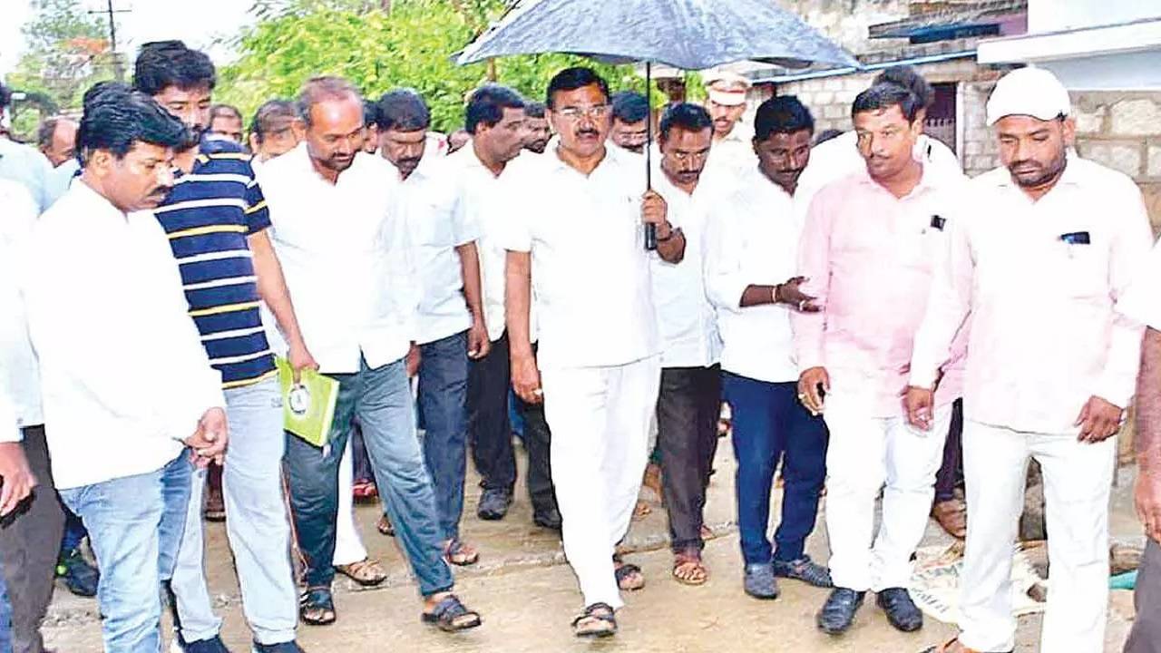 Agriculture Minister Singireddy Niranjan Reddy inspecting the CC road constructed at a cost of Rs 2.5 crore in Wanaparthy district on Wednesday.