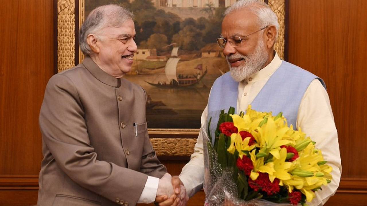 File Photo: Former Chief Justice of India and former Governor of Kerala, P. Sathasivam and PM Narendra Modi (L-R) (Photo Courtesy: Twitter/@PMOIndia)