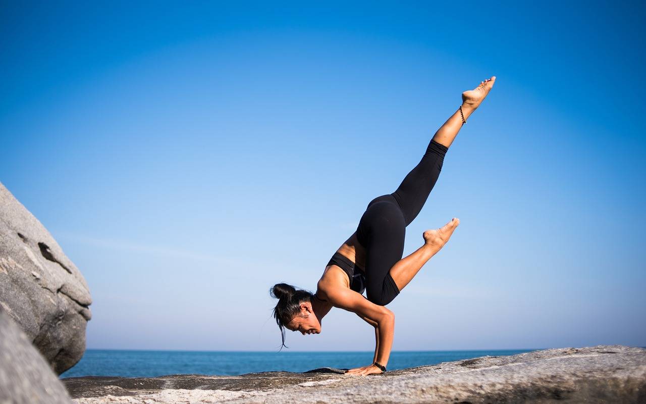 Women promoting International Yoga Day (Photo Courtesy: Pixabay)