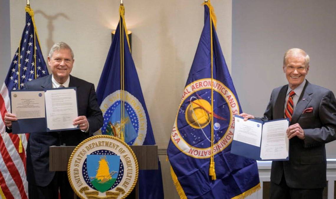 U.S. Secretary of Agriculture Thomas Vilsack (left), and NASA Administrator Bill Nelson, pose for a photograph after having signed MoU, Wednesday, June 21, 2023, at the USDA’s Jamie L. Whitten Building in Washington. (Credit- NASA)