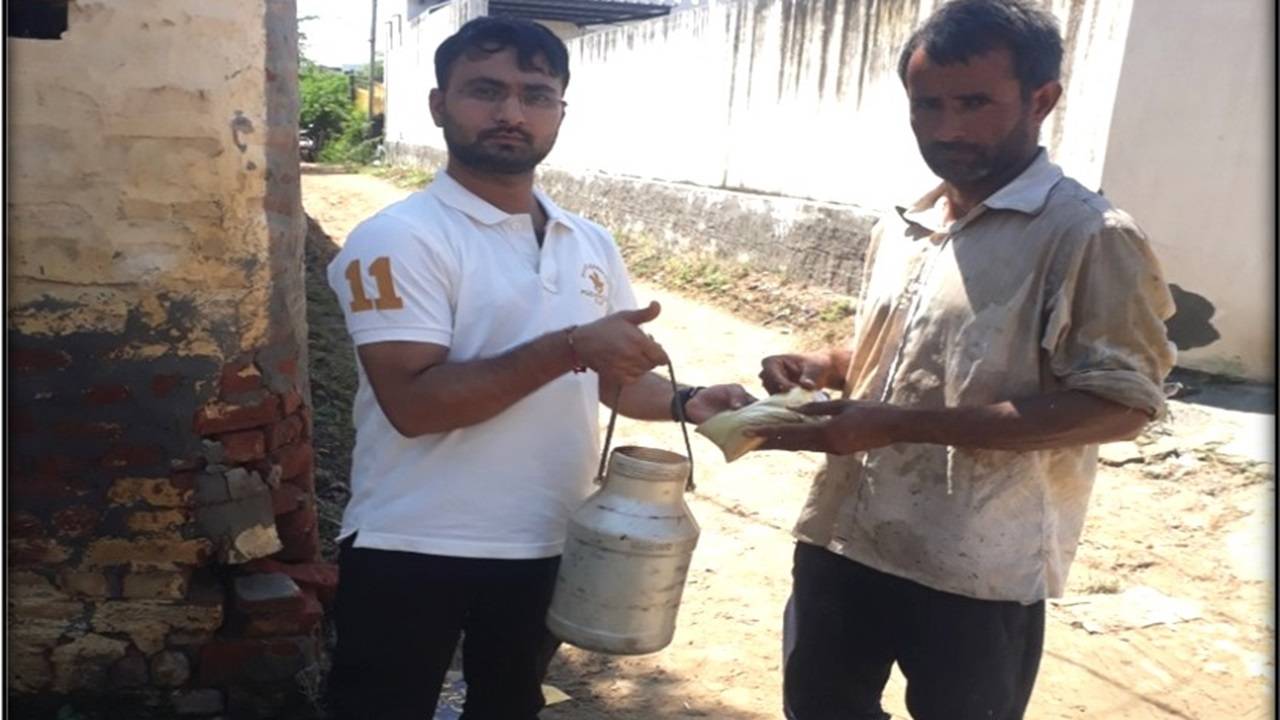 Under Farmer FIRST Project, providing cumin and molasses supplement to the buffalo farmer of village Kathura (Sonipat)