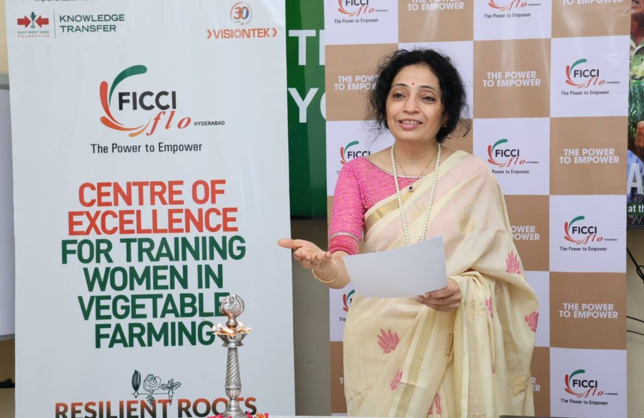 Priya Gazdar Chairperson of FLO Hyderabad seen speaking at the launch of Centre Of Excellence for Training Women In Vegetable Farming