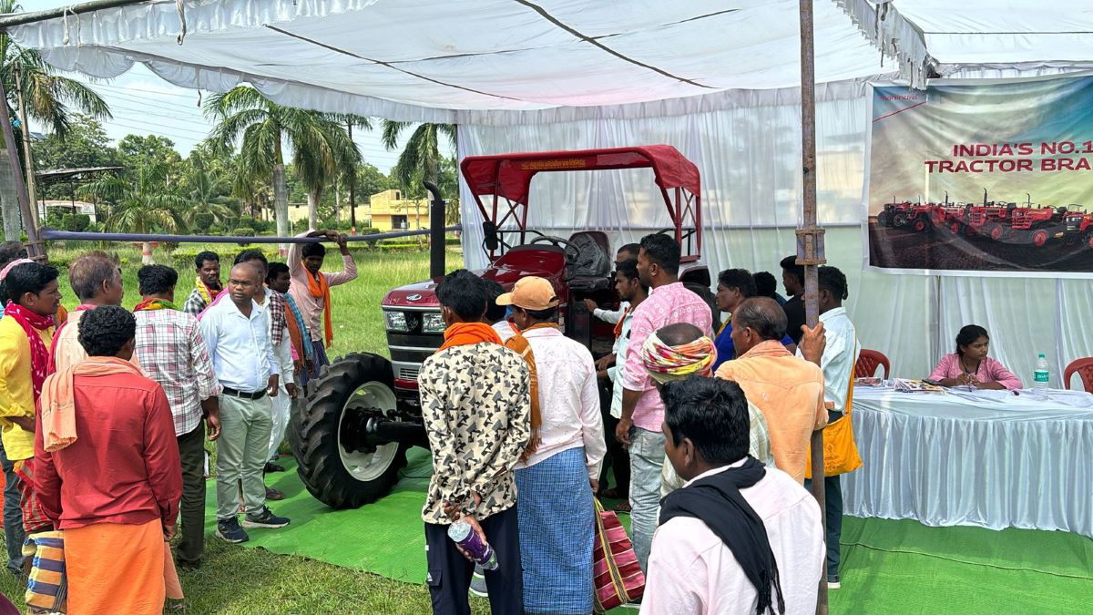 Farmers witnessing latest model of Mahindra Tractors