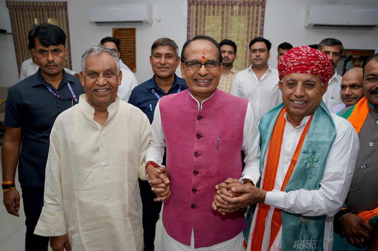 L-R (Ramnath Thakur, Shivraj Singh Chouhan, Bhagirath Choudhary)