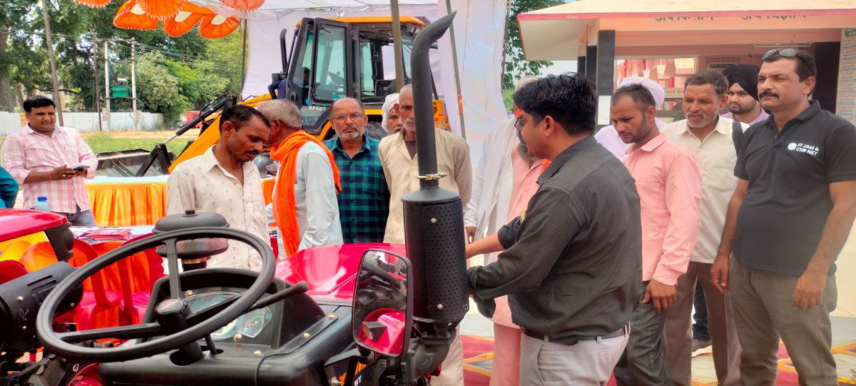 Farmers at the stall of Mahindra Tractors