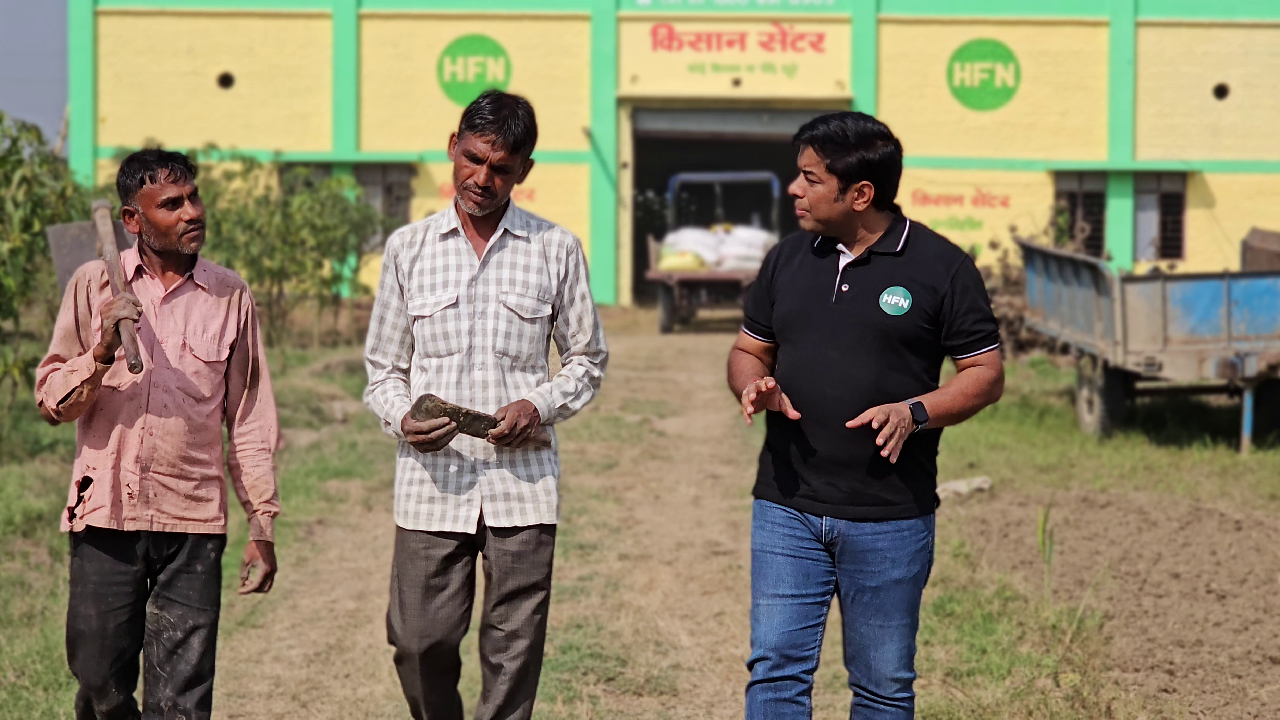 Ruchit G Garg interacting with the farmers at the HFN Kisan Center