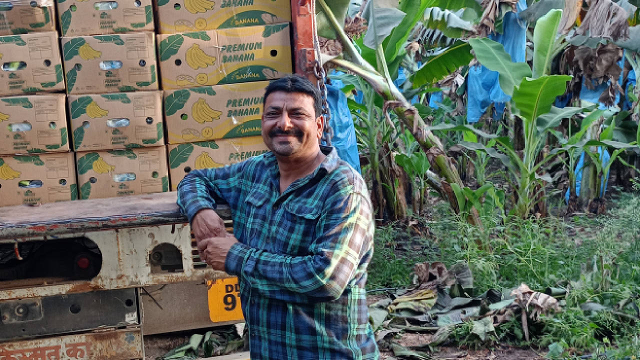 Dhirender Desai with his boxes of bananas for export