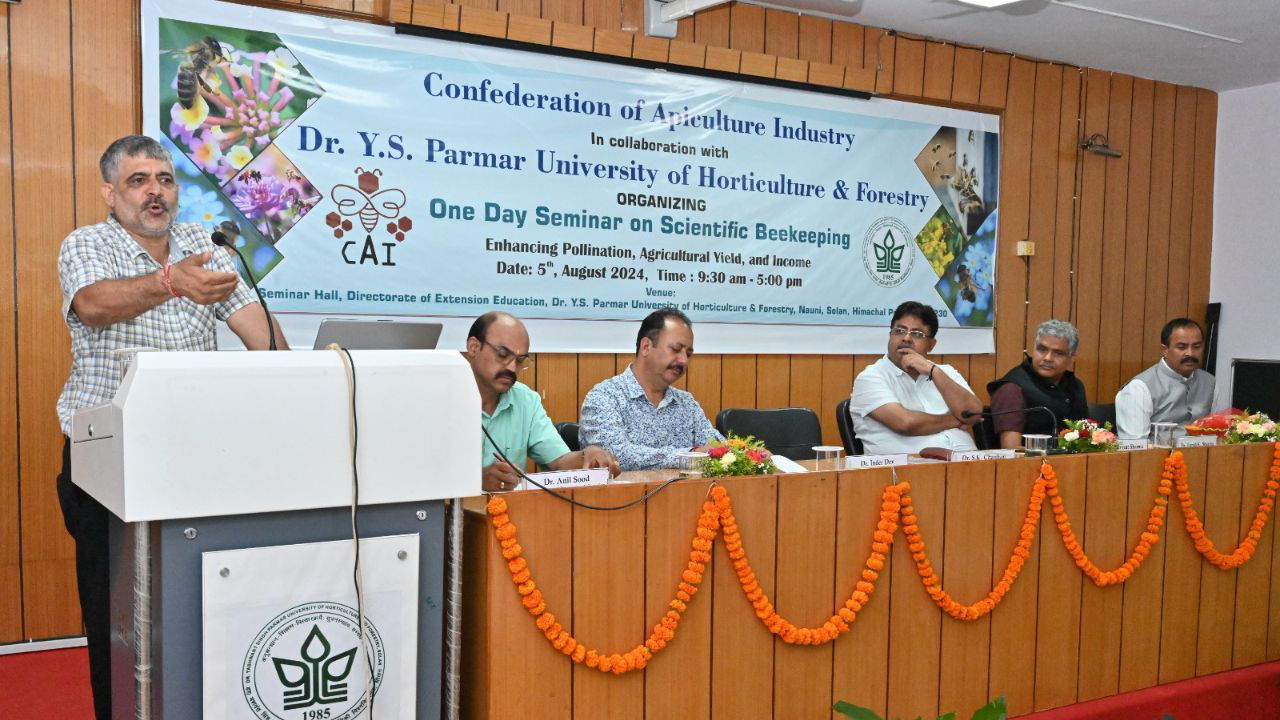 Dr SK Chauhan addressing beekeepers during the seminar